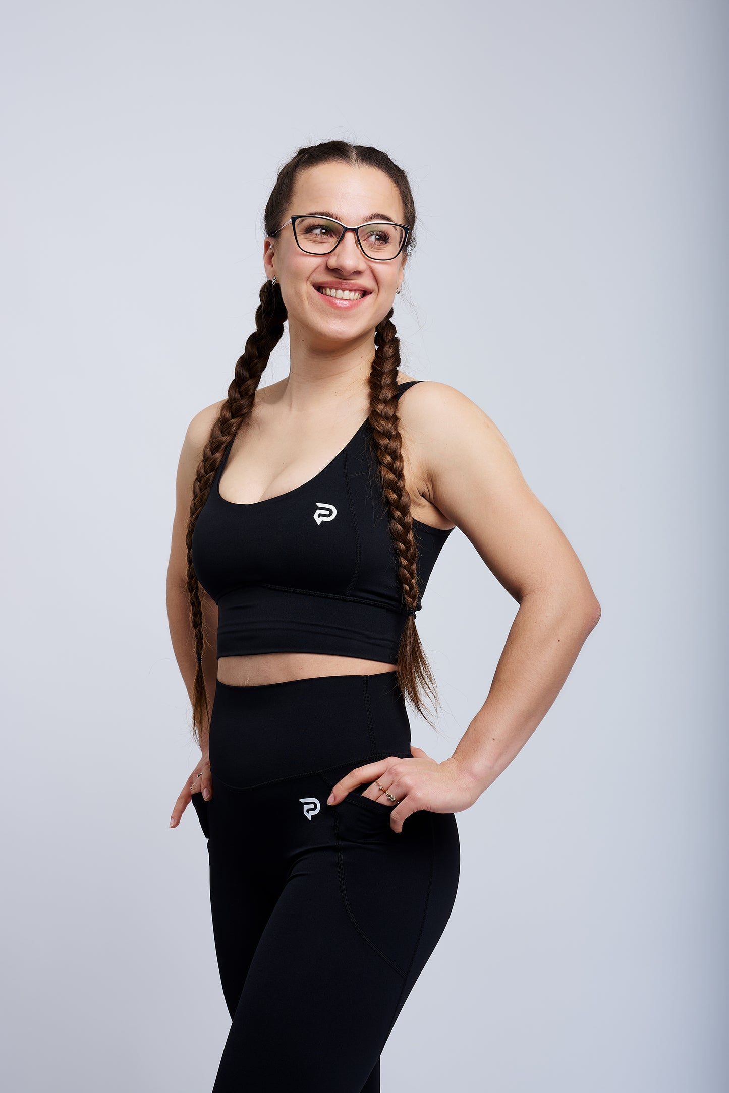 PRXJECT IRON women's black premium performance sports bra – supportive gym wear for training, lifting, and high-impact workouts