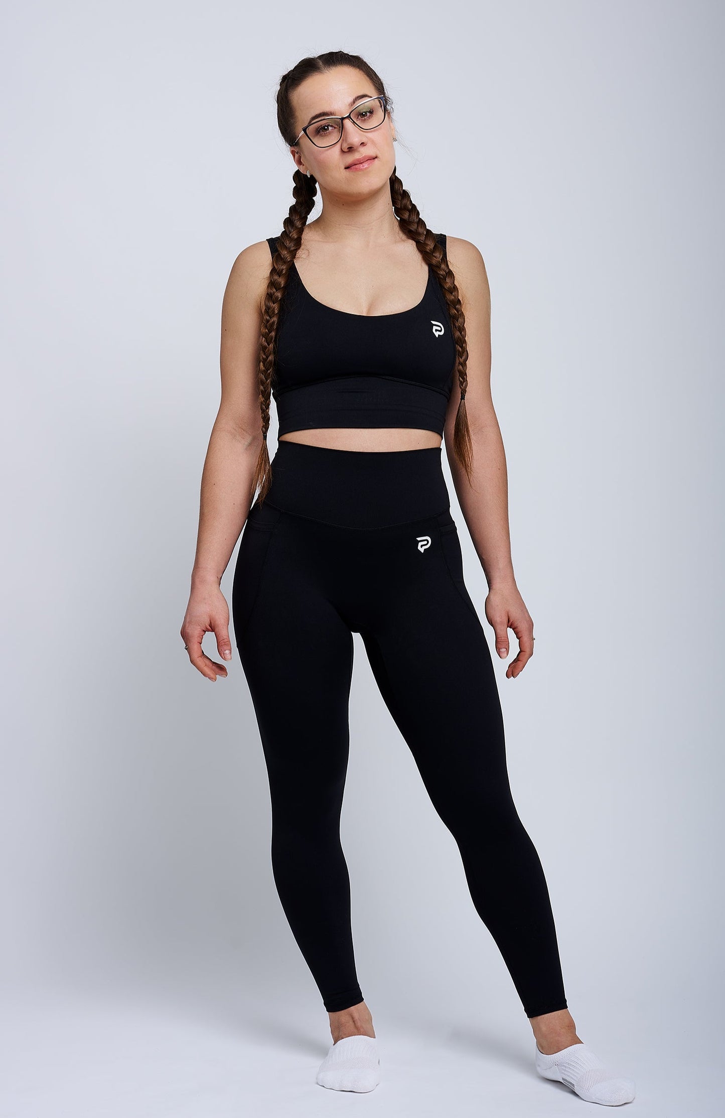 PRXJECT IRON women's black premium gym set – matching sports bra and high-waisted leggings for performance training, fitness, and activewear