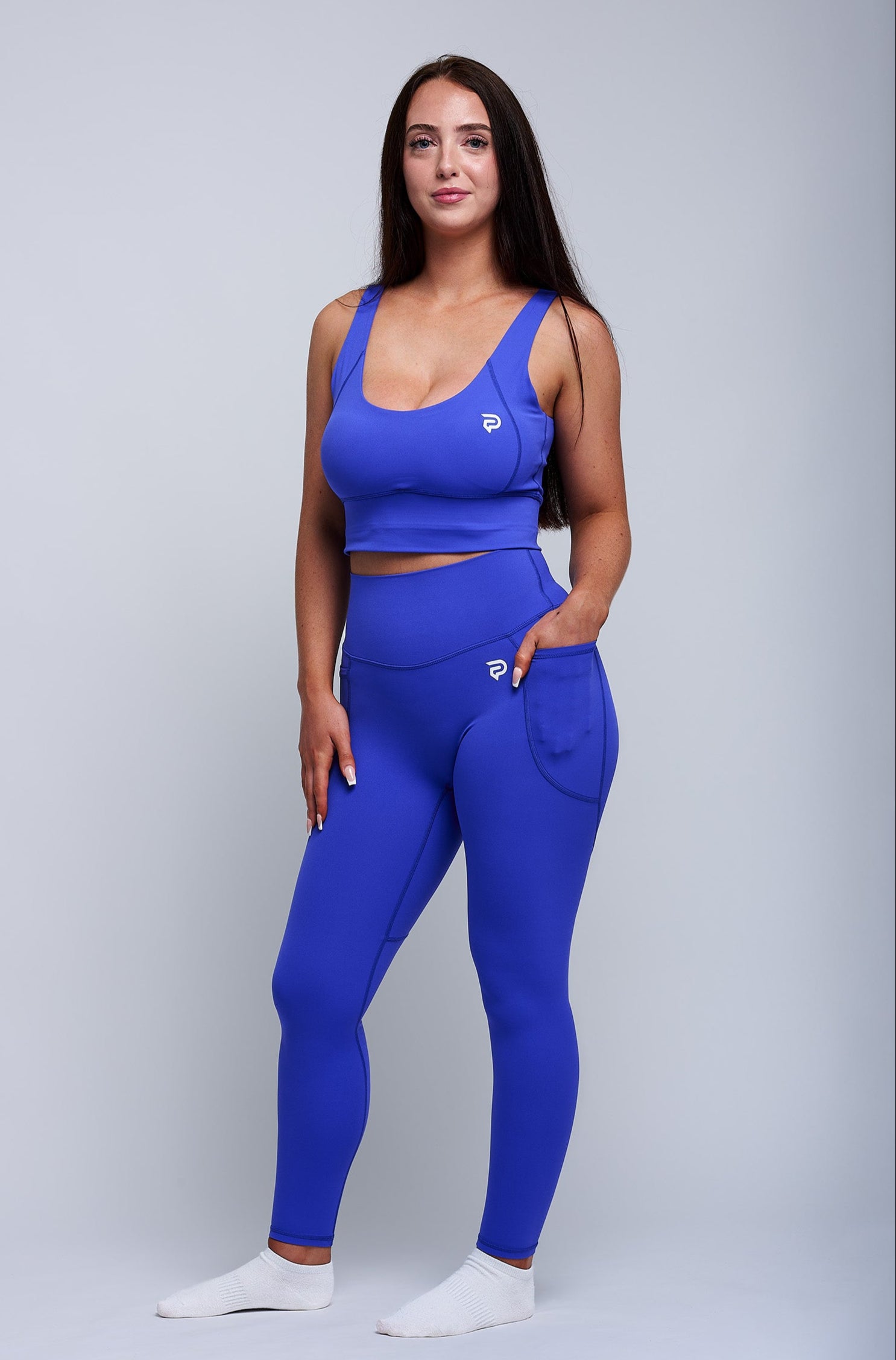 PRXJECT IRON women's blue premium gym set – matching sports bra and high-waisted leggings for performance training, fitness, and activewear